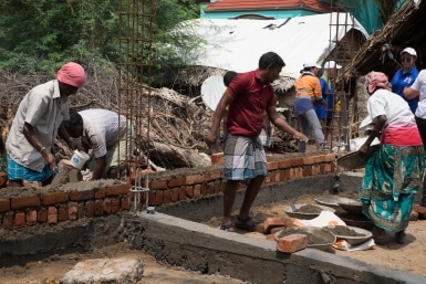 Villagers join in building a home in India for Habitat for Humanity