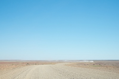 Dust on the road to Birdsville and The Big Red Bash