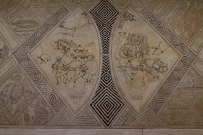 Mural etched into polished plaster made to look like marble at Central Station