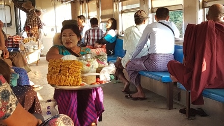 Food vendor in Myanmar wears Thanaka