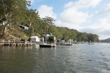 Dangar Island is lined with boatsheds and jettys