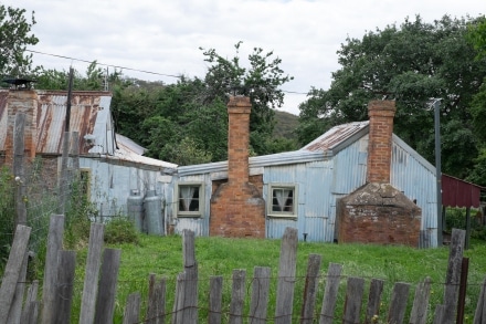 Cottages built from various materials survive in Hill End 